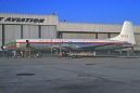 Photo: Society Generale d'Alimentation, Canadair CL-44, 9Q-CWS